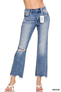 Distressed knee raw hem jeans