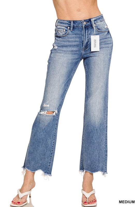 Distressed knee raw hem jeans